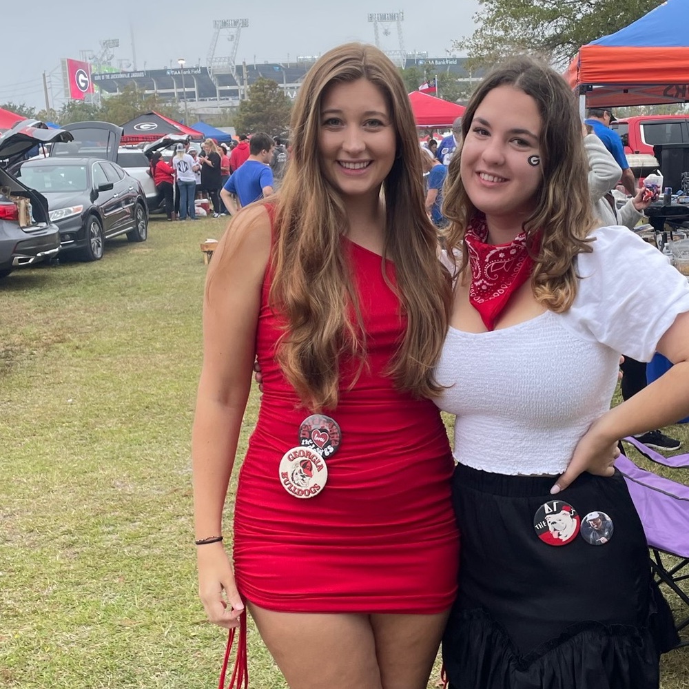 Red dress. Ties in the side allows you to pick how short or long the dress is